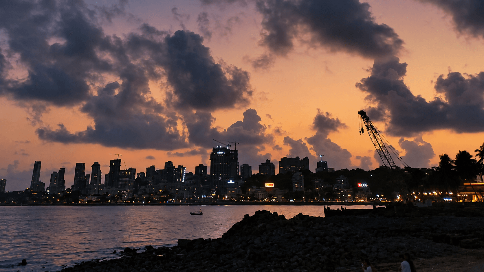 City skyline beneath dramatic evening clouds